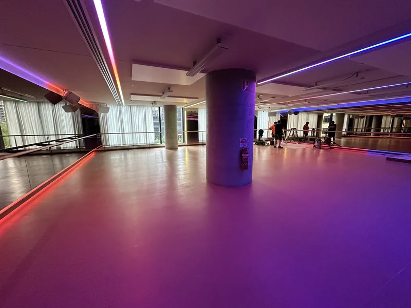 Studio floor and column detail under coloured lighting