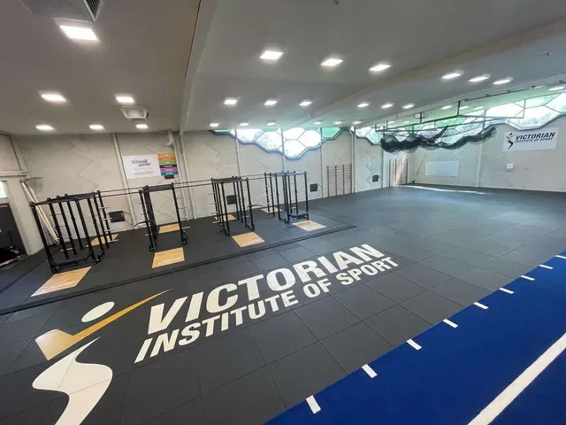 Strength and conditioning floor with a sprint track and rubber tiles